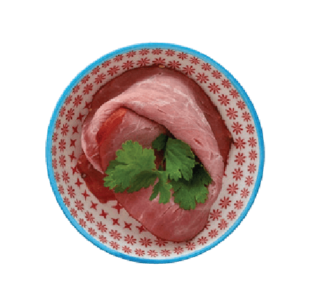Beef pastrami arranged in a small patterned bowl with a cilantro garnish.